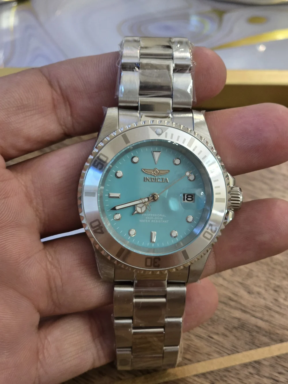 Invicta Men’s Professional Turquoise Dial Stainless Steel Dive Watch